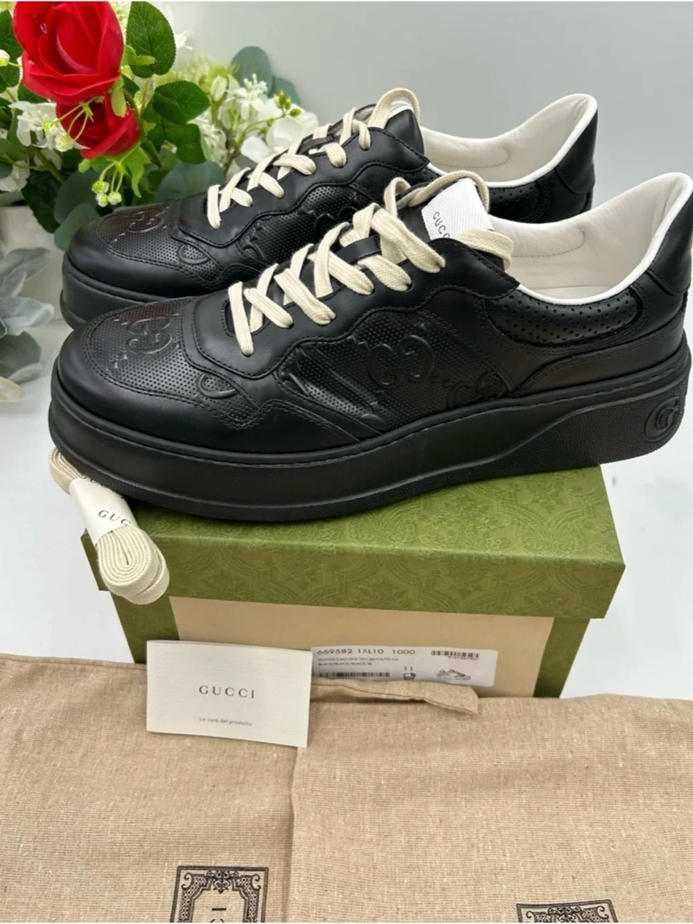 Gucci, GG embossed, black leather sneakers size 11 fits 11.5 made in Italy
